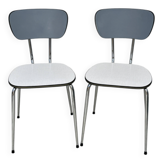Set of two vintage grey Formica and chrome chairs.