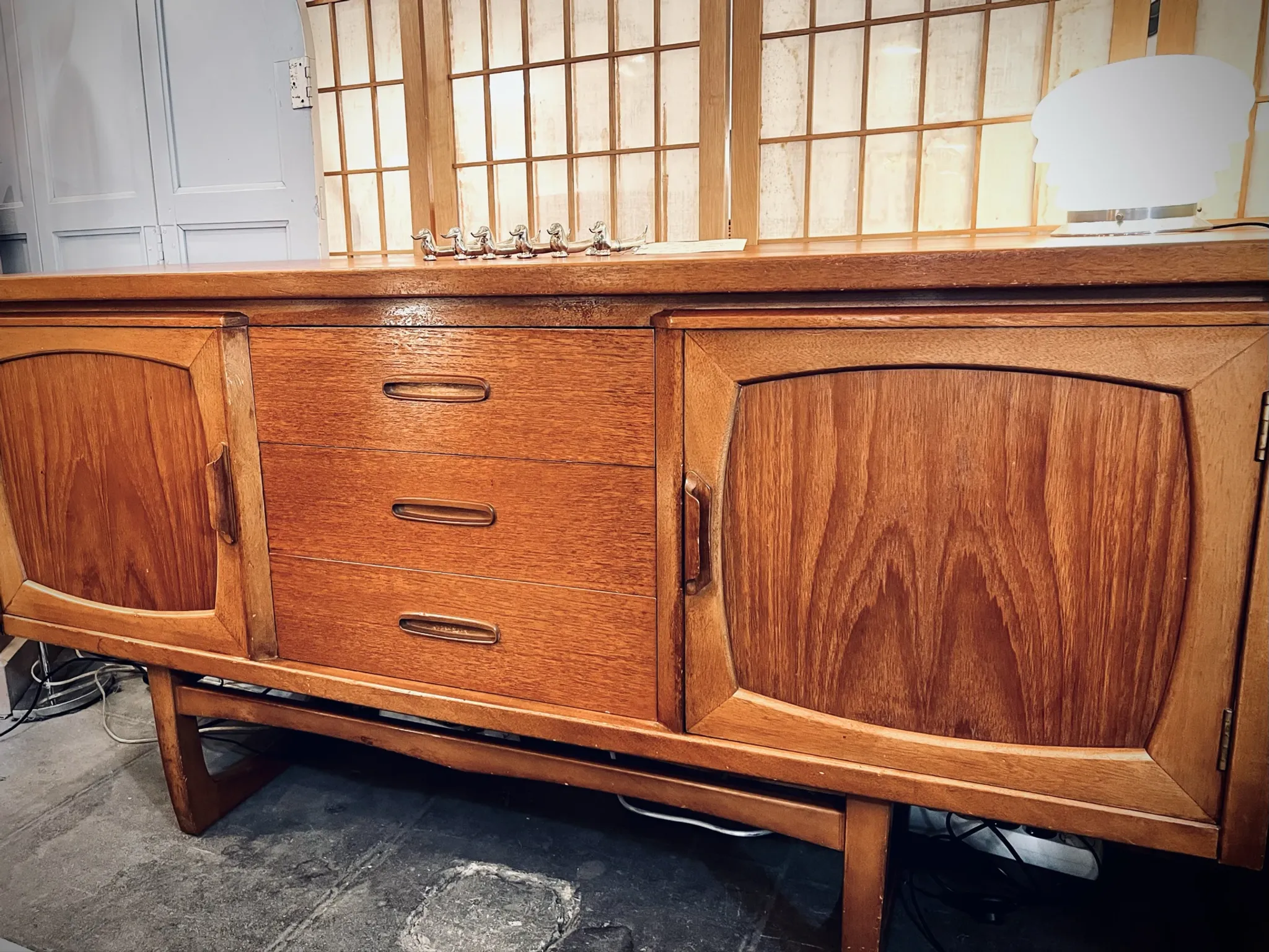 Classic British mid-century teak enfilade, circa 1960s.