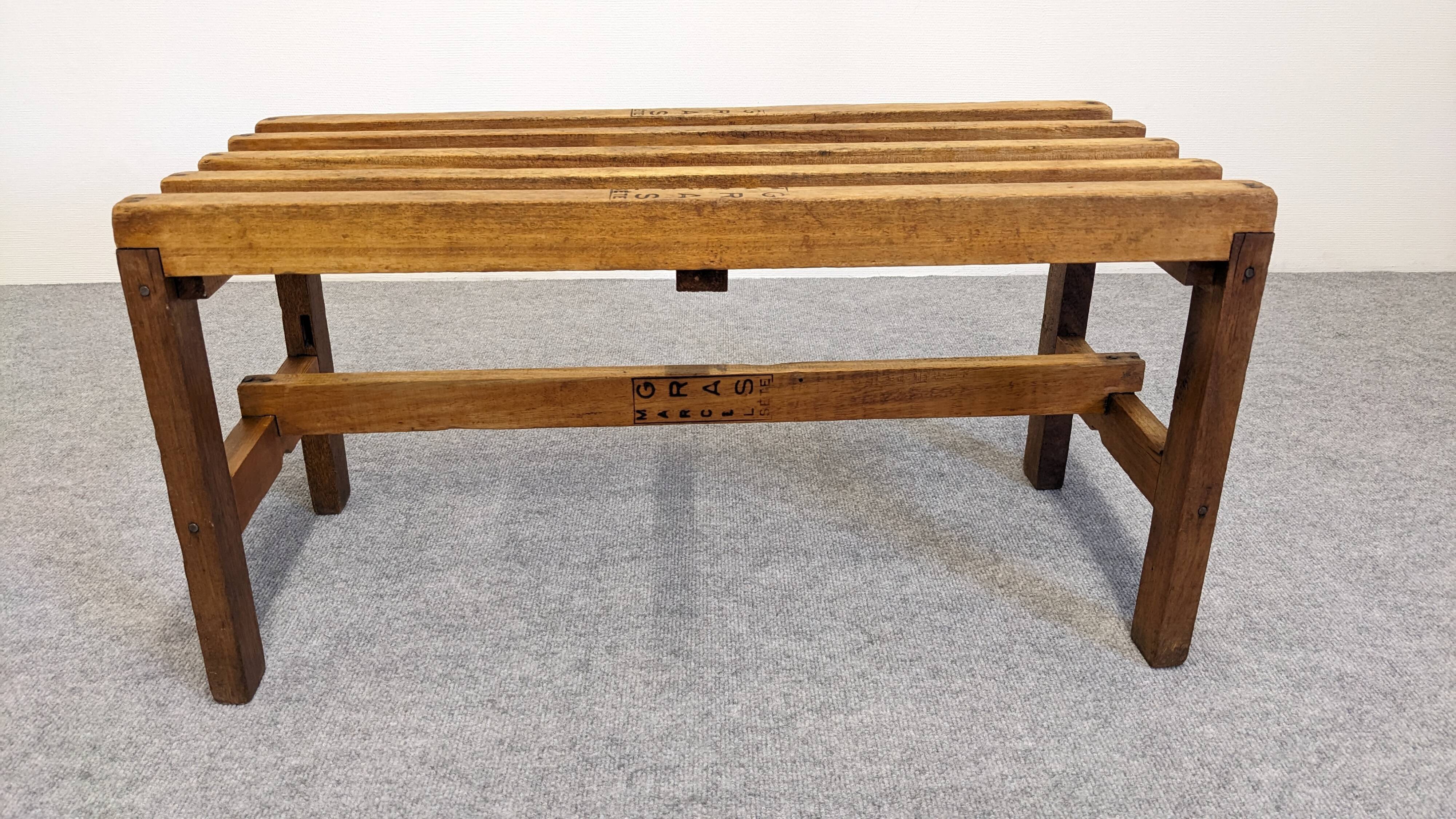Wooden slatted display bench or support, France circa 1960.