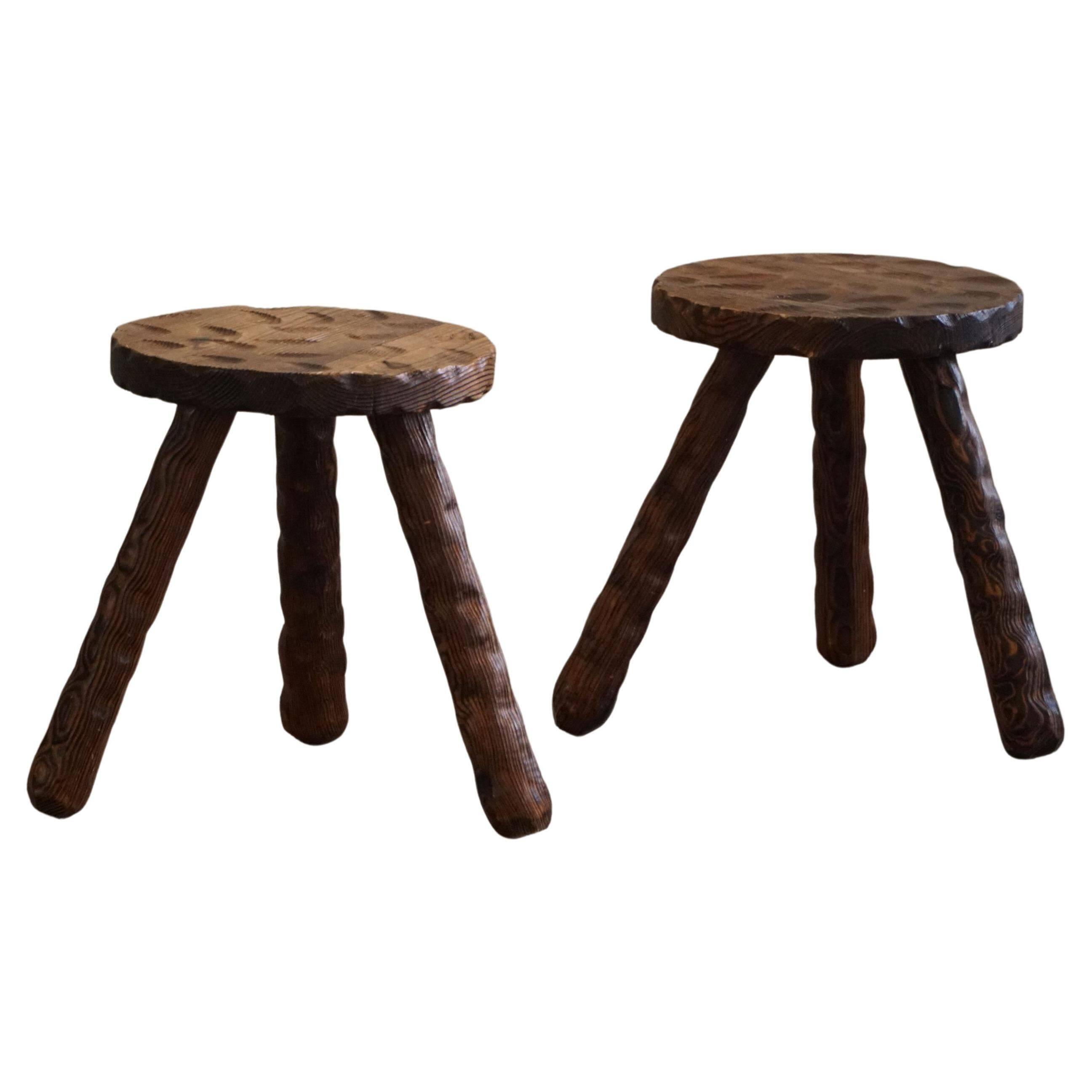 A pair of Wabi Sabi stools carved from pine, mid-century modern Swedish style, 1960s.