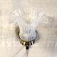 Art Deco wall light in brass with glass shade - mid 20th century.
