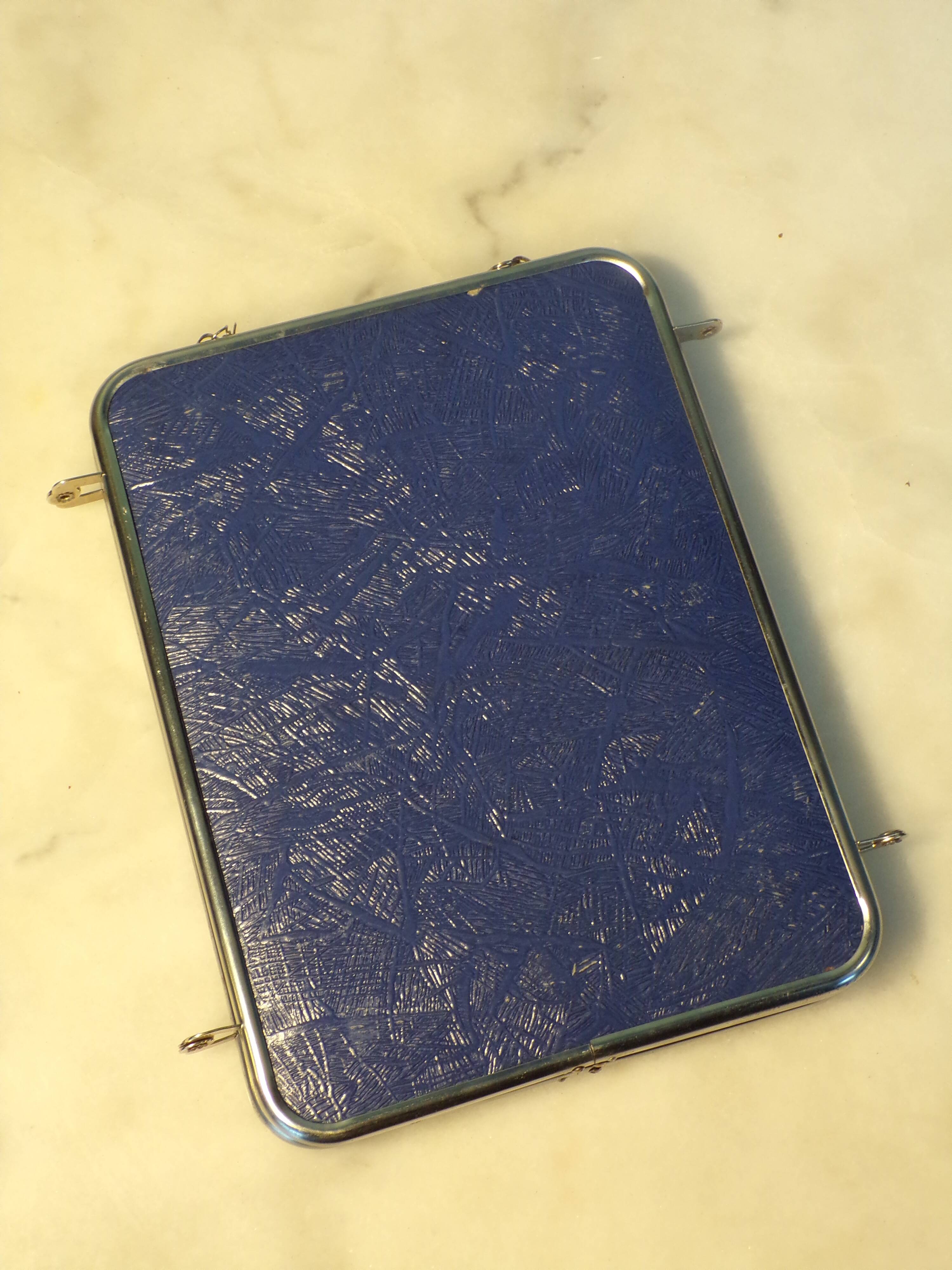 Triptych mirror with chain.