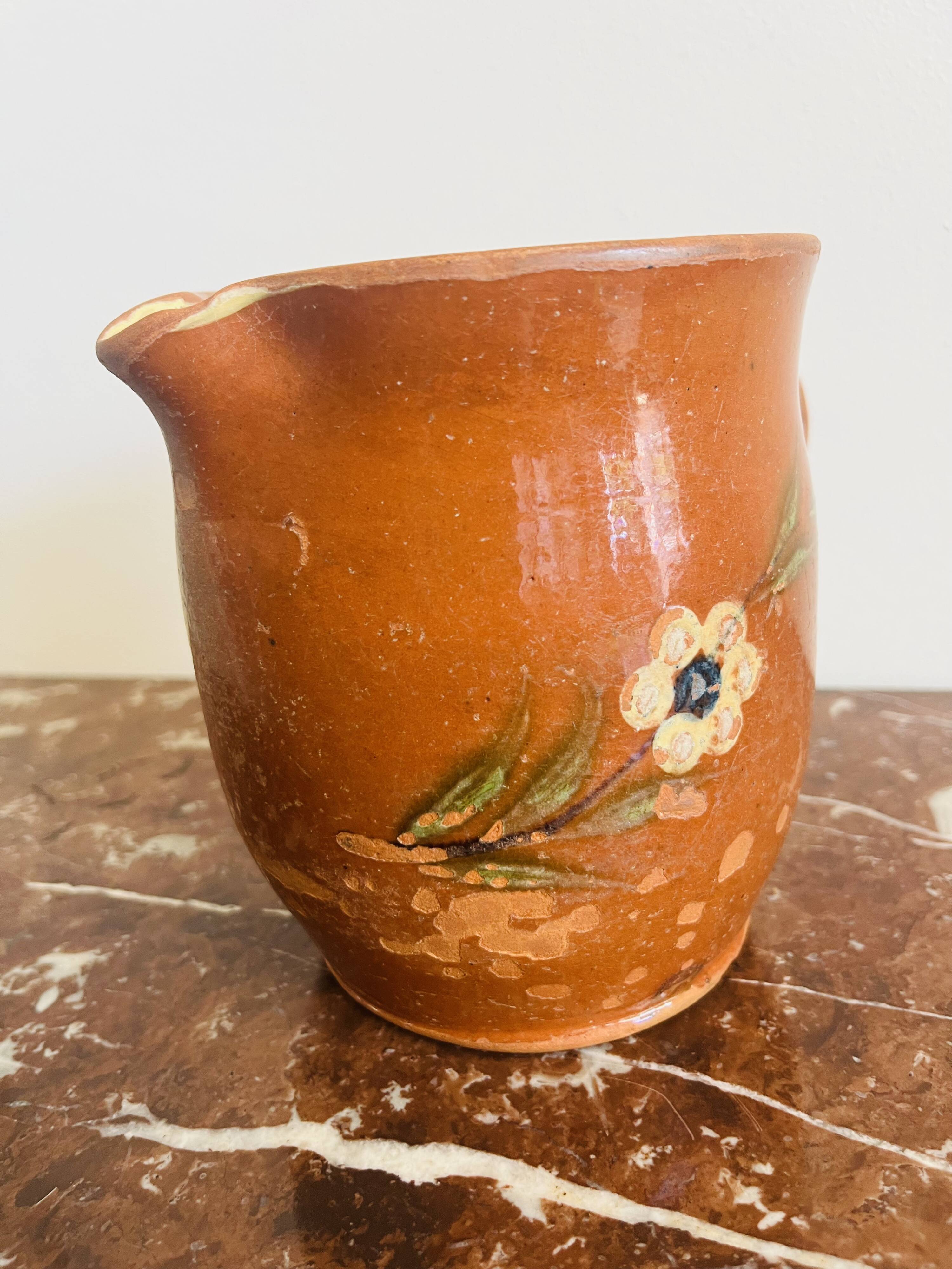 Ancienne poterie pichet savoyard à décor floral