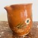 Ancienne poterie pichet savoyard à décor floral