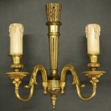 Pair of Louis XVI style quiver sconces in gilded bronze