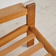 Brutalist armchair in oak and leather by Tage Poulsen, Denmark, 1970s.