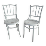 Pair of Lichtig bistro chairs in painted grey beech, pressed seat, circa 1900.