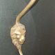 Set of 5 antique "Lion Head" coat hooks.