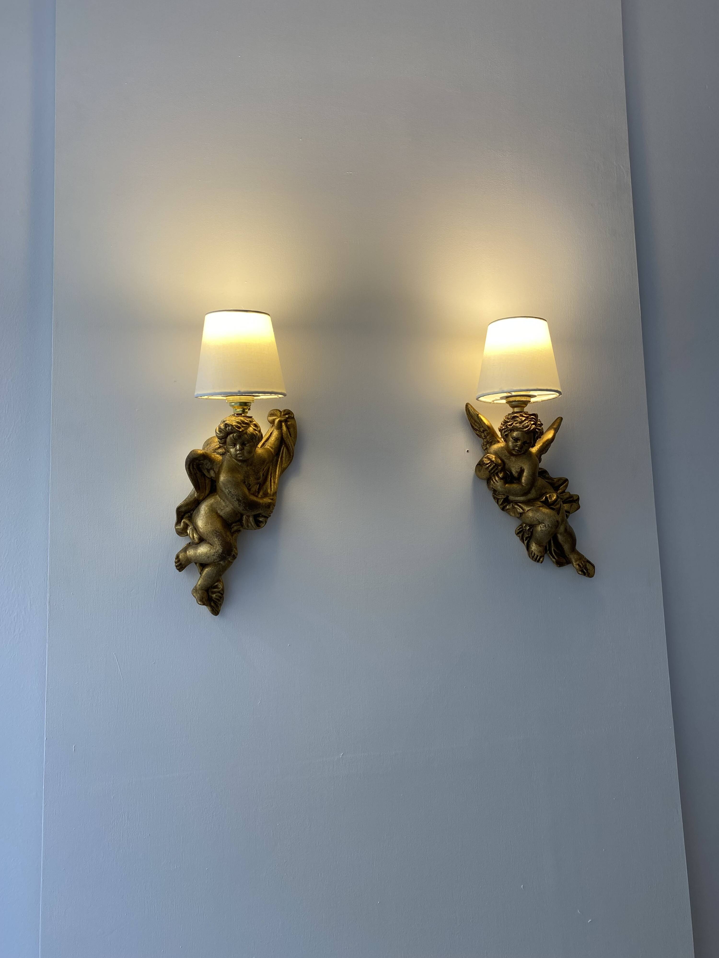 Pair of golden Puttis wall lights