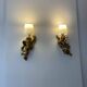 Pair of golden Puttis wall lights