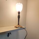 Lamp with a 19th-century chiseled bronze base and antique glass shade
