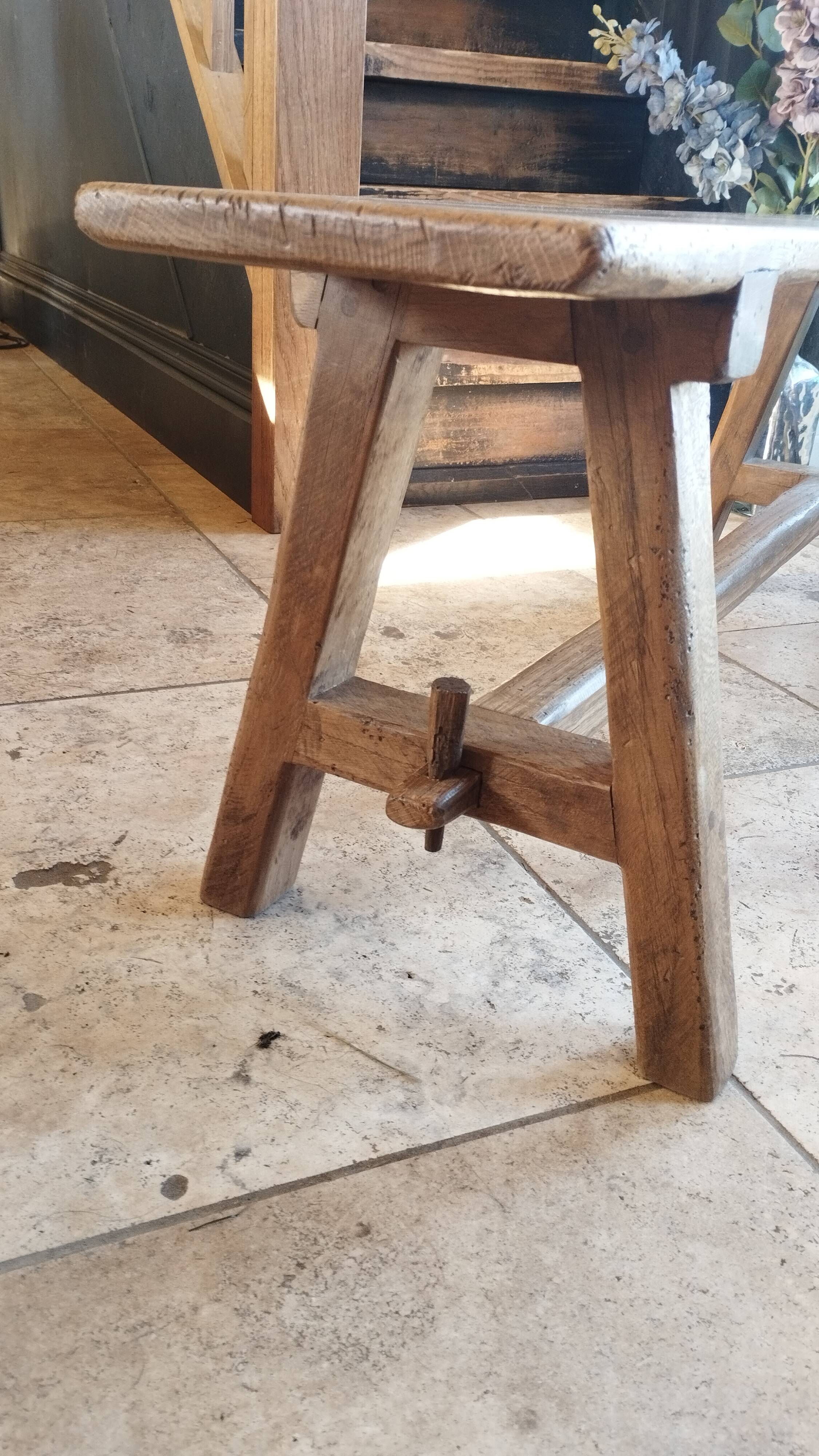 "A frame" bench in solid oak, patinated.