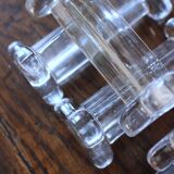 A set of 6 transparent trilobite glass knife rests.