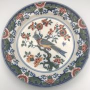 Assiette murale en faïence à décor de peinture de fleurs et oiseau 28 cm
