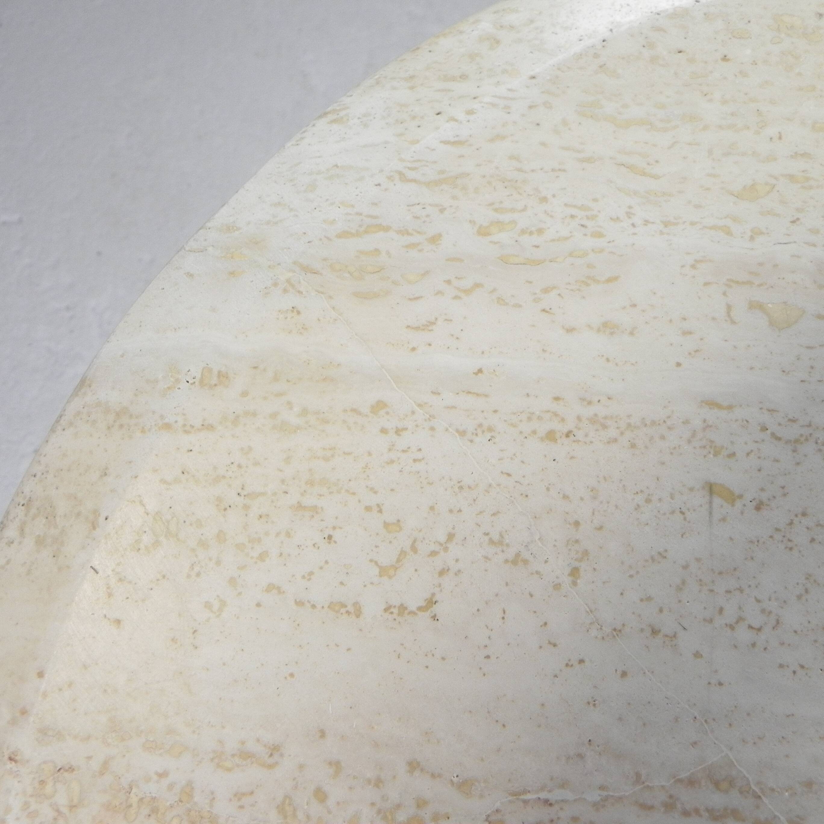 Mid-Century travertine coffee table with an oval top, 1970s.