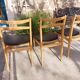 5 Scandinavian style chairs, wood and black faux leather.