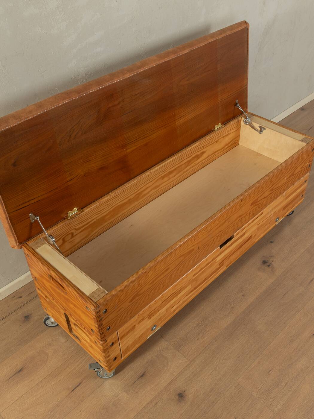 Unique storage chest as a storage cabinet and bench.