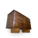 A vintage Italian chest of drawers, made of veneered walnut and solid wood,