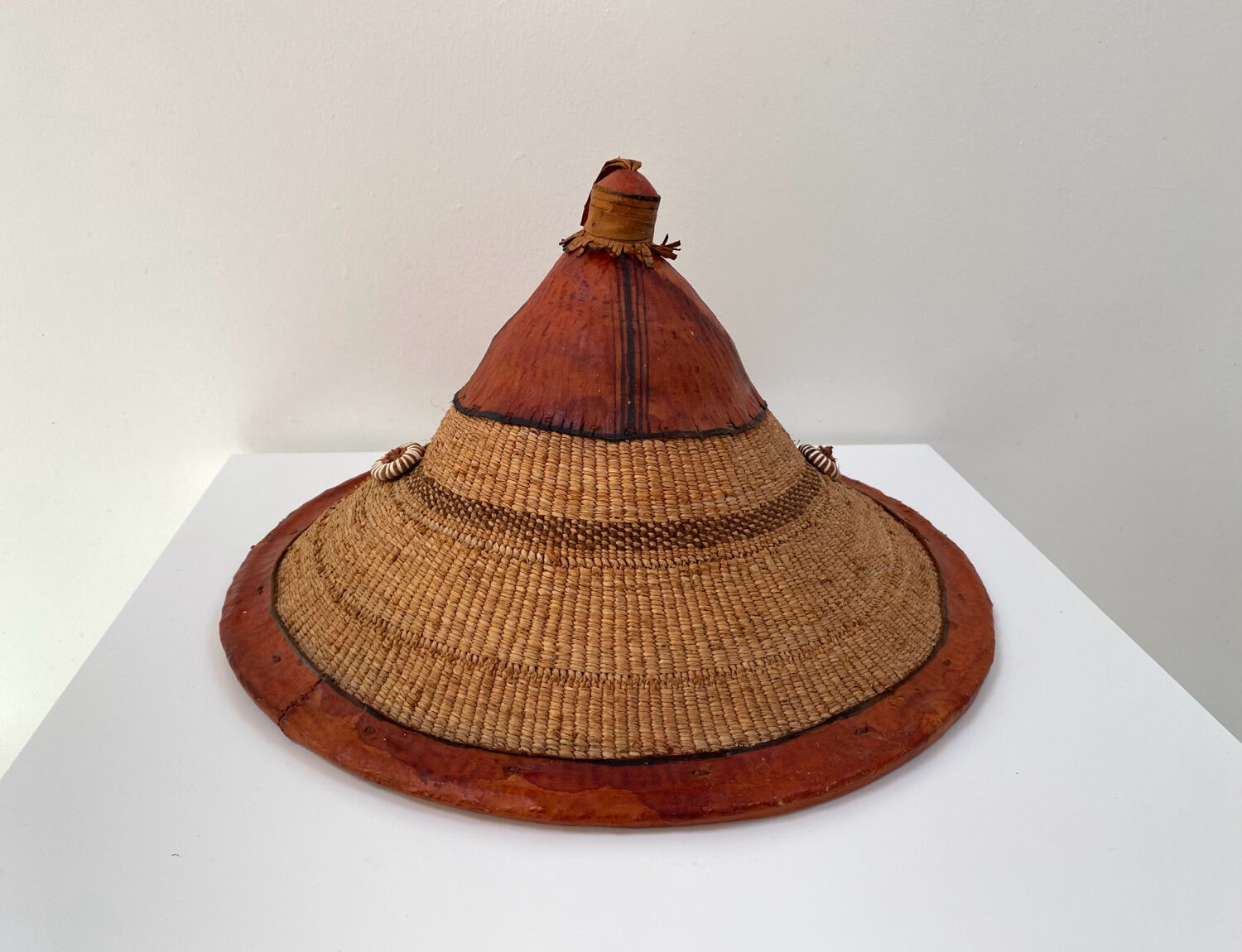 Traditional African Fulani hat in leather and woven straw