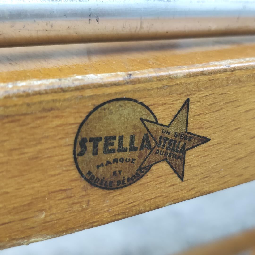 Four 60s wooden Stella chairs