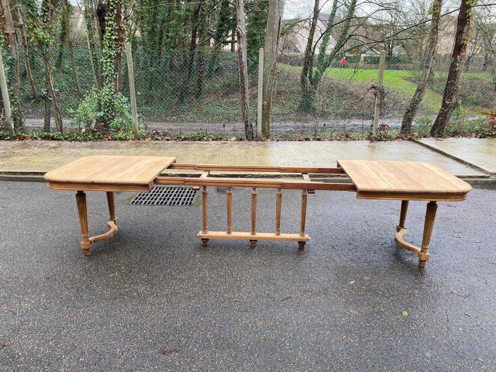 Renovated dining table in solid oak from the 19th century in Napoleon III style.