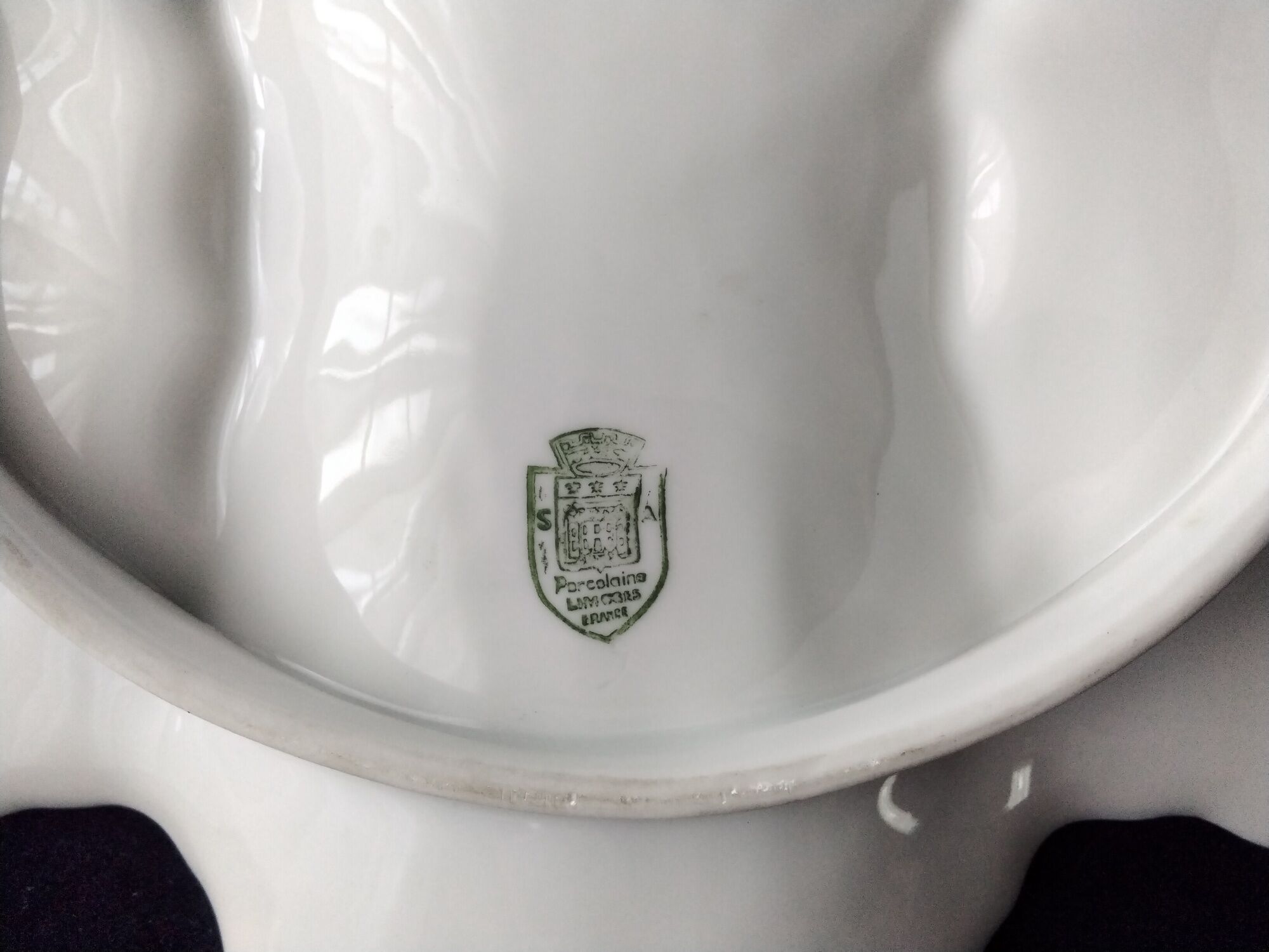 Compartmented bowl in Limoges porcelain. Aromatic plant decor