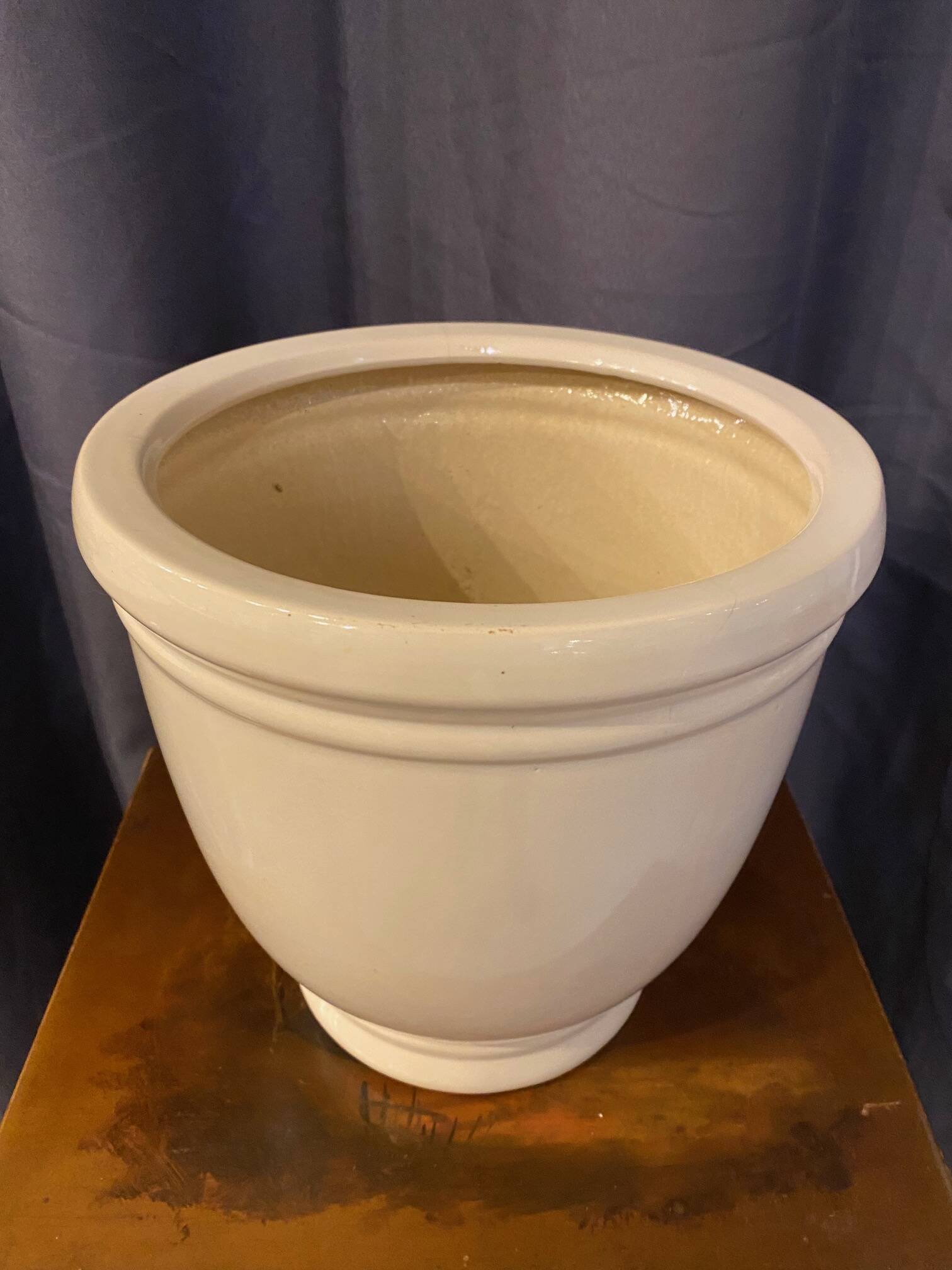 Cache pot en ceramique couleur gres clair forme ronde