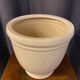 Cache pot en ceramique couleur gres clair forme ronde