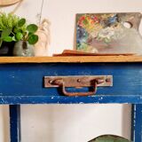 Ancient blue pie wooden workshop table