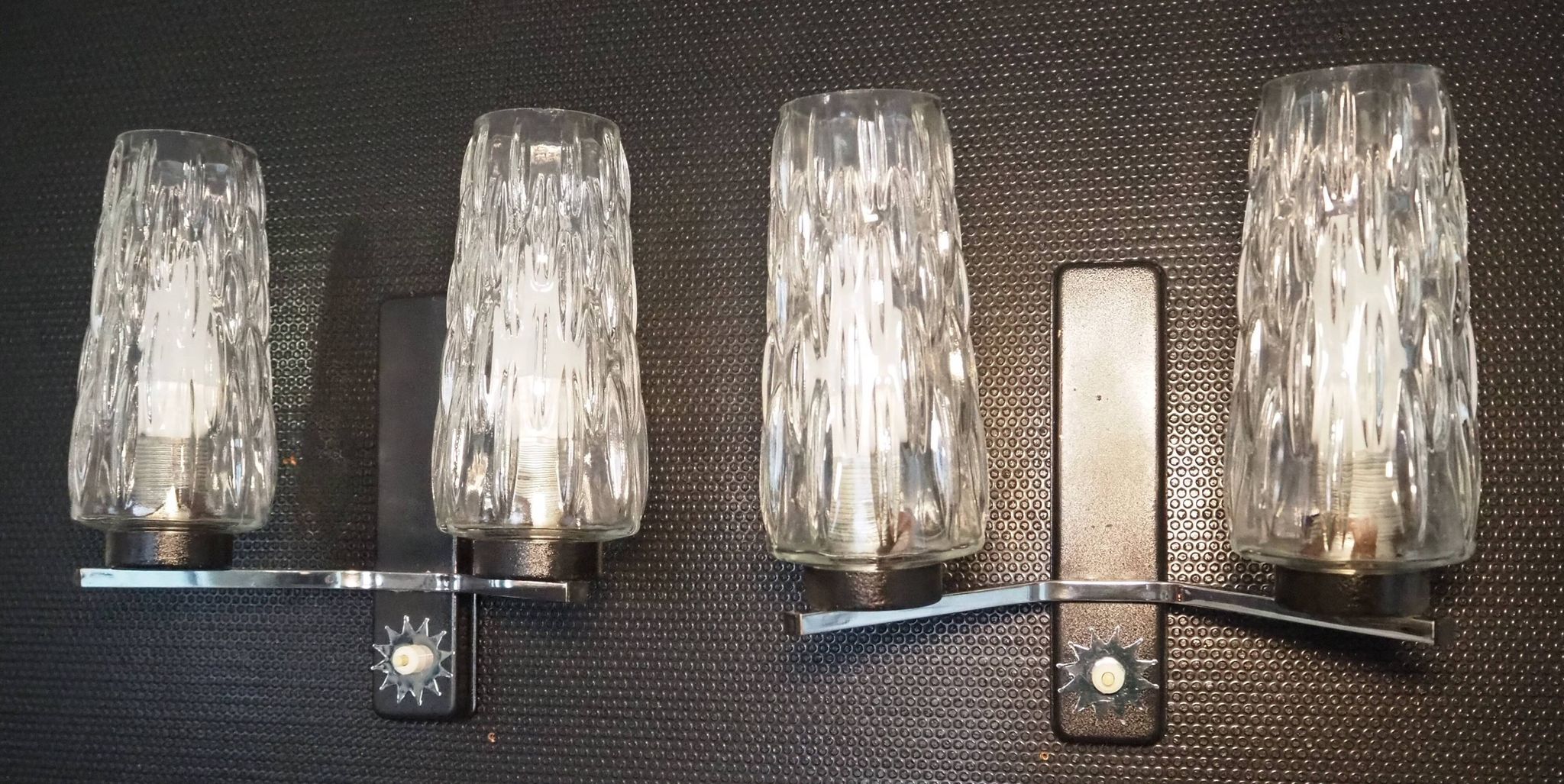 Pair of wall lights from the 1950s-1960s with a push button switch.