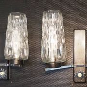 Pair of wall lights from the 1950s-1960s with a push button switch.