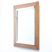 Art deco beveled mirror in an oak frame, 1940s.