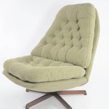 Green swivel Scandinavian armchair