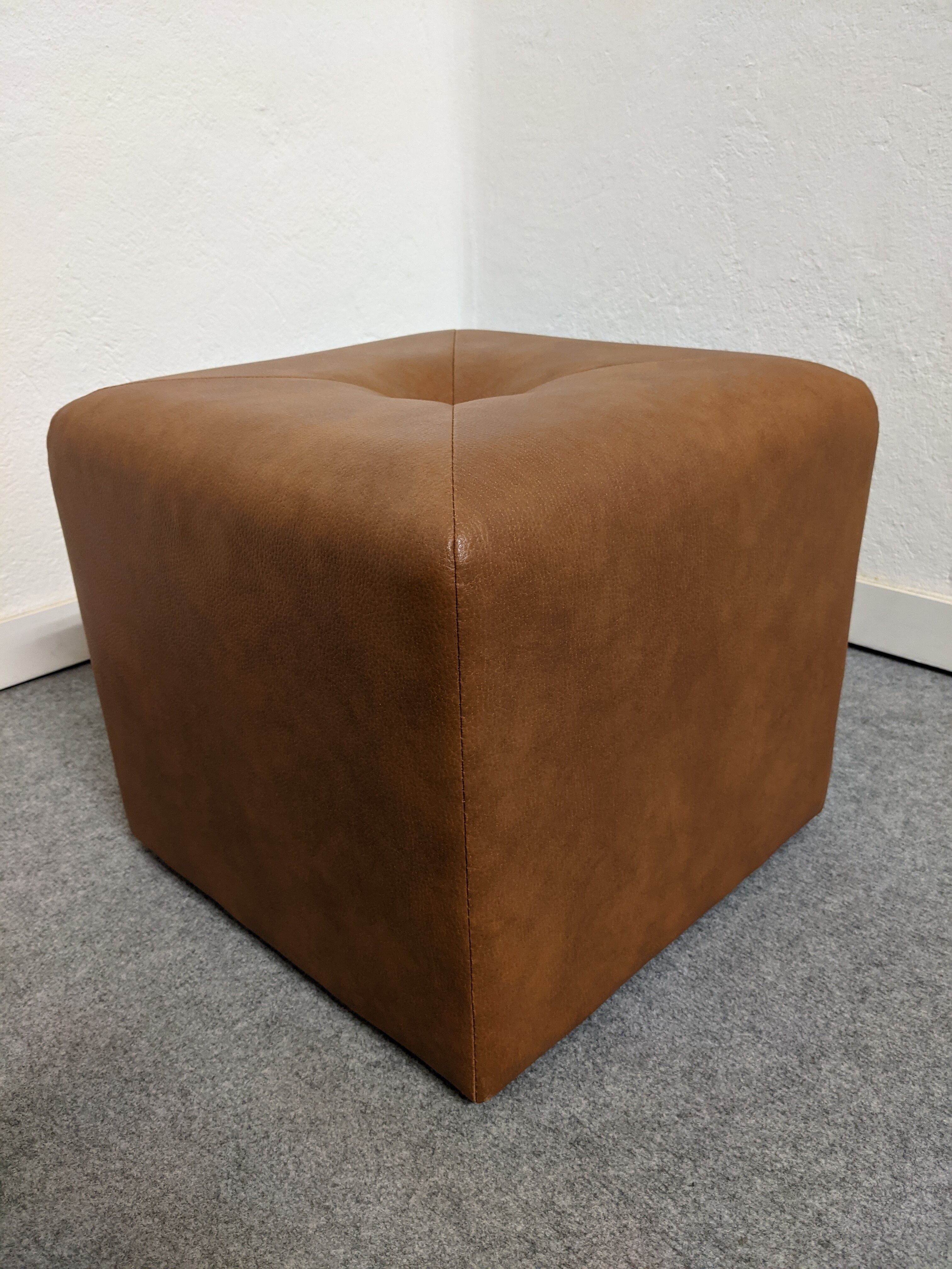 Vintage leather ottoman