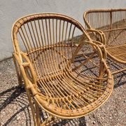 Rattan lounge with two armchairs and a vintage 1950s bench.