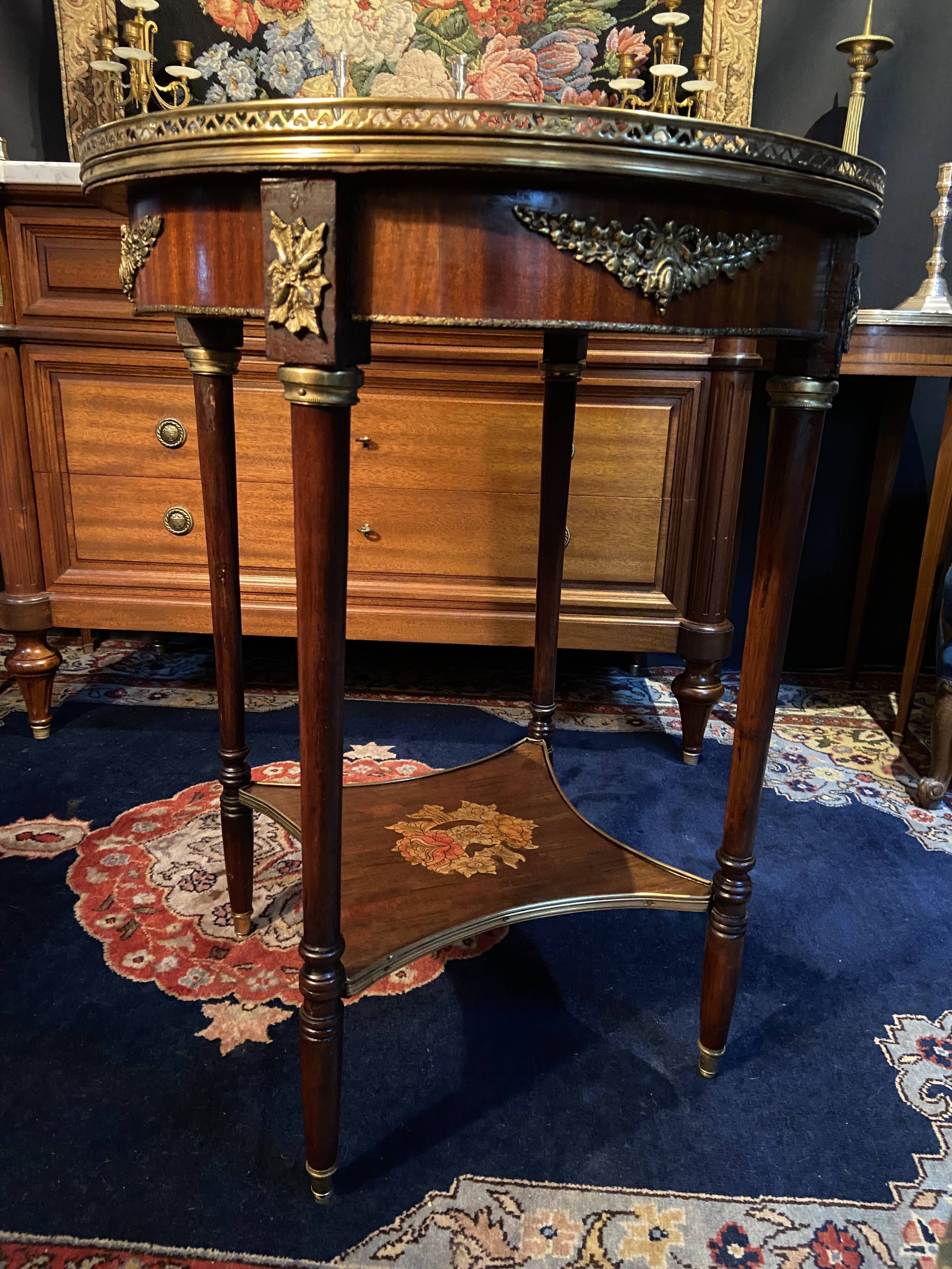 Bouillotte table pedestal table with marquetry decoration and bronze ornaments in the Louis style