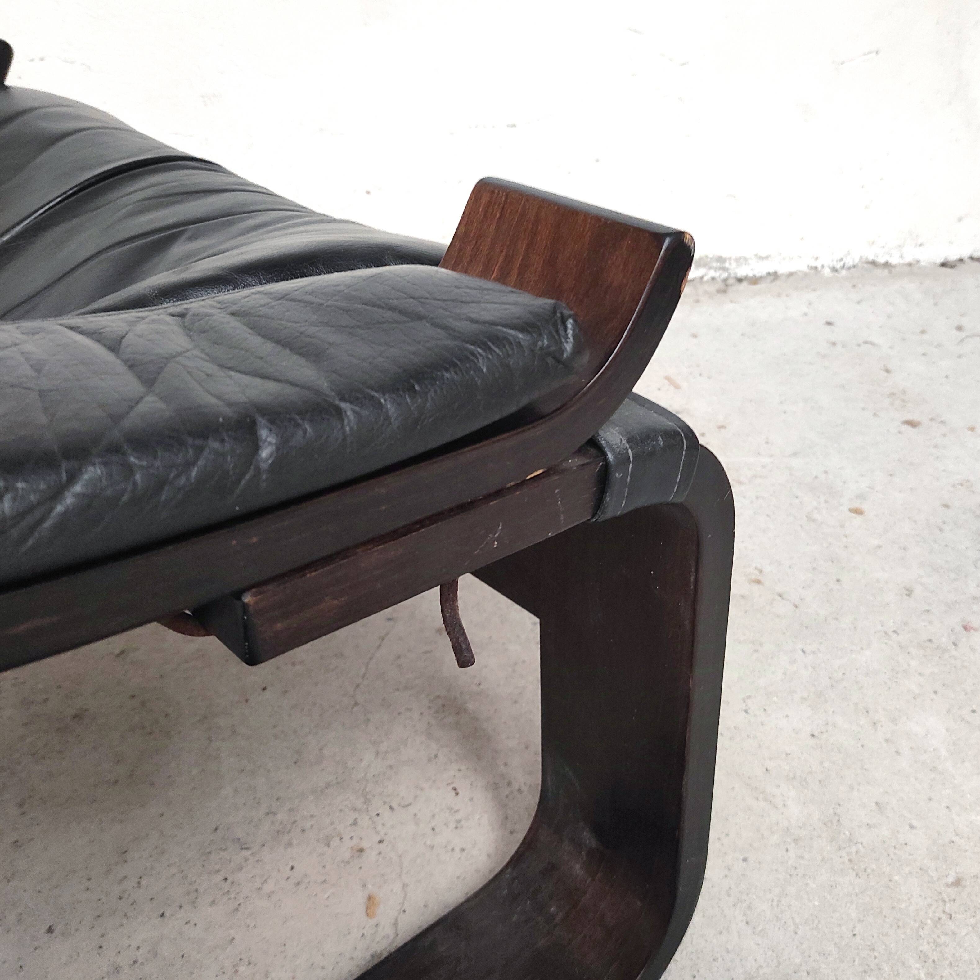 Pair of Kroken armchairs in black leather