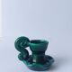 Green ceramic candlestick holder
