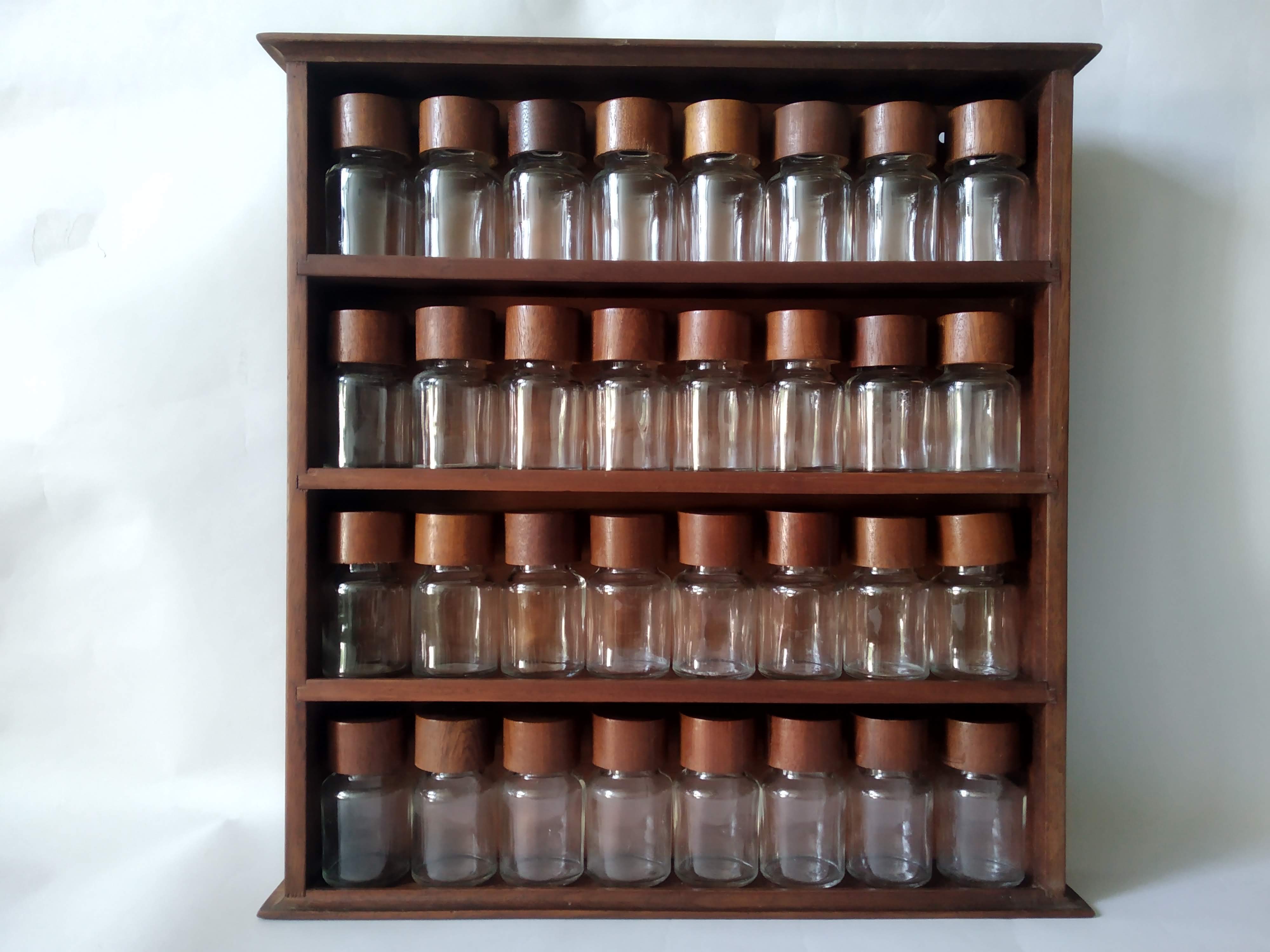 Wooden shelf with 32 vintage Cole & Mason spice jars