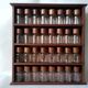 Wooden shelf with 32 vintage Cole & Mason spice jars