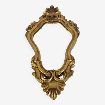 Gold stucco rocaille style mirror