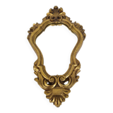 Miroir style rocaille en stuc doré