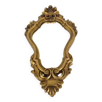 Gold stucco rocaille style mirror