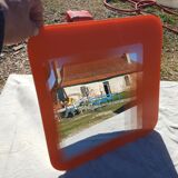 Vintage orange glass mirror