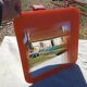 Vintage orange glass mirror