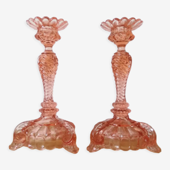 Pair of pink candle holders