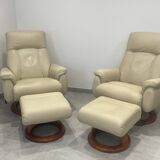 Pair of vintage leather armchairs with ottoman