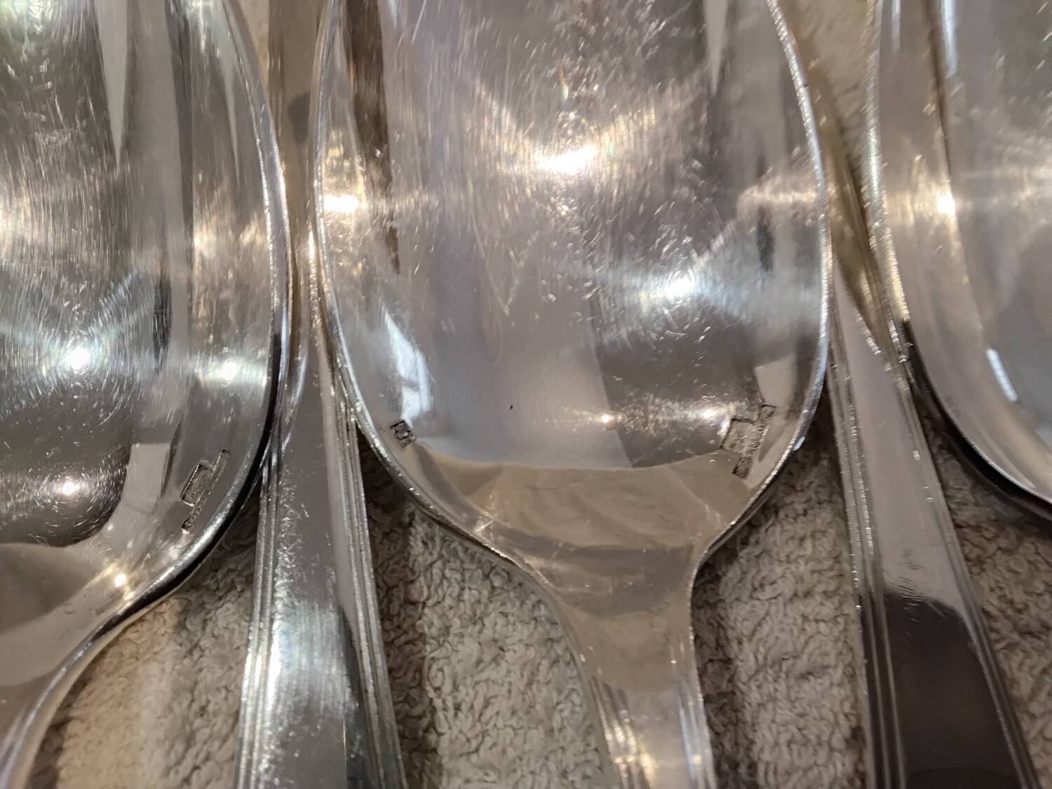 12 silver-plated soup spoons by Christofle America