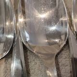 12 silver-plated soup spoons by Christofle America