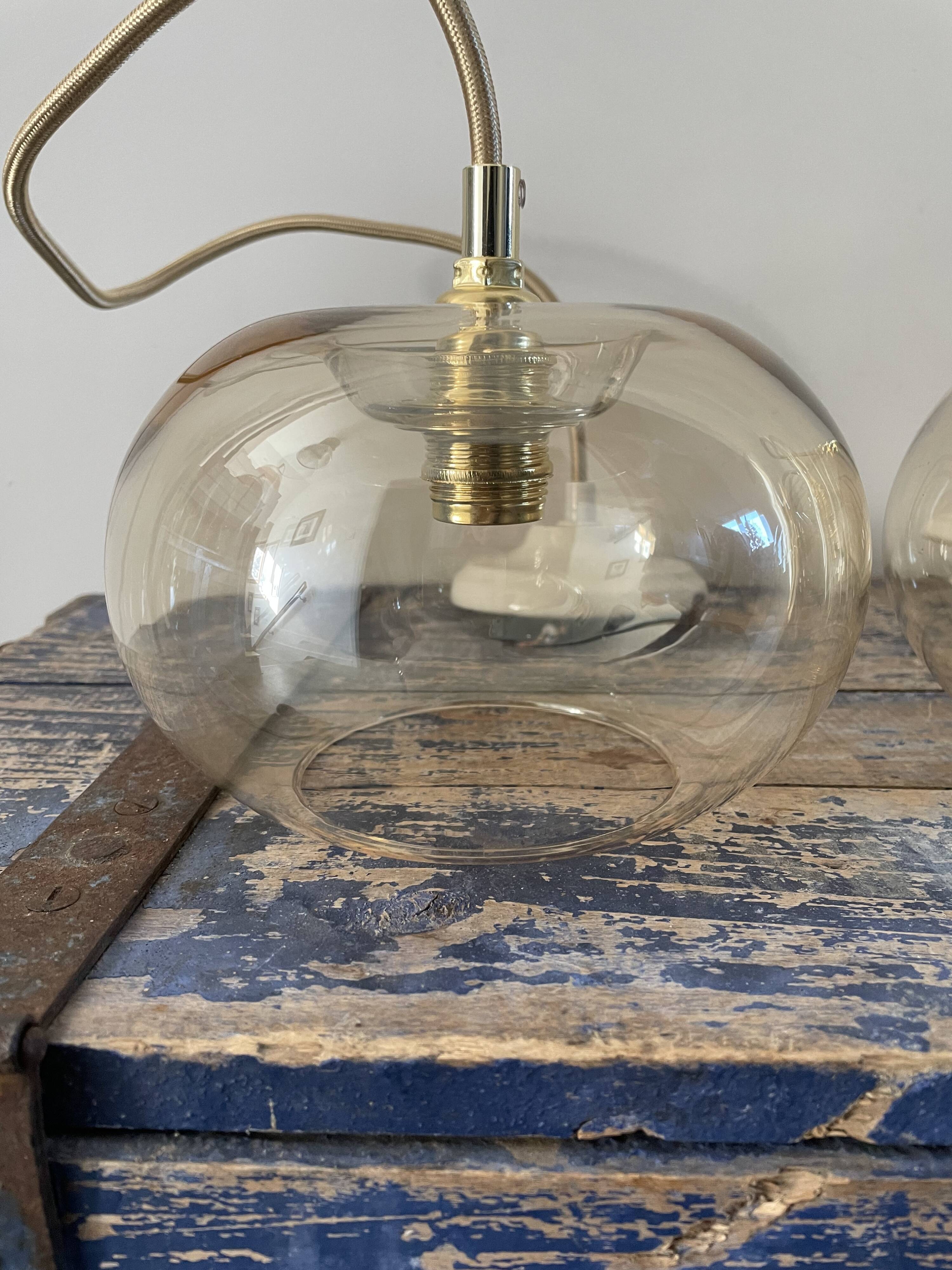 Set of three glass hanging lamps
